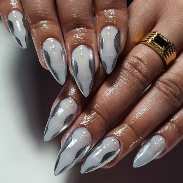 Metallic nails offer an easy way to create a bold look that functions like jewelry — you can wear them seamlessly with any outfit.