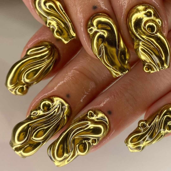 Metallic nails offer an easy way to create a bold look that functions like jewelry — you can wear them seamlessly with any outfit.