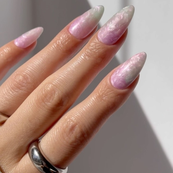 Pink ombre nails are trending for summer 2024. Here, explore our favorite pink ombre nail designs.