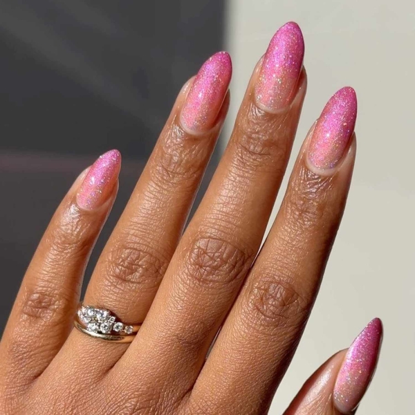 Pink ombre nails are trending for summer 2024. Here, explore our favorite pink ombre nail designs.