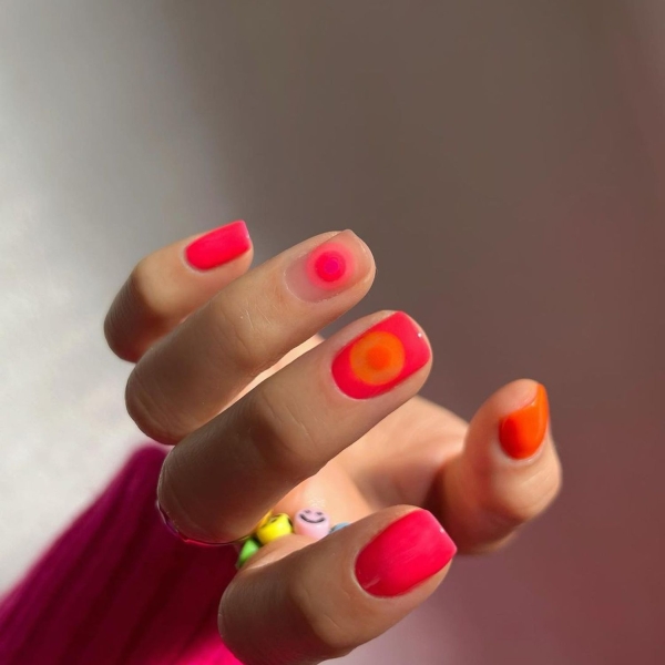 Pink ombre nails are trending for summer 2024. Here, explore our favorite pink ombre nail designs.