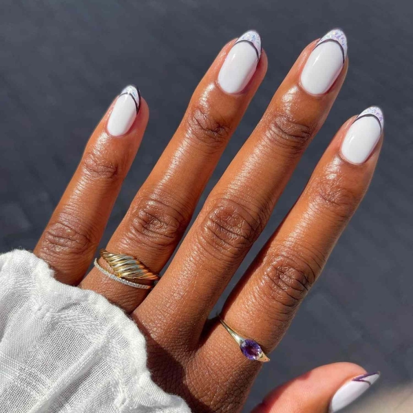 Simple white nail designs never go out of style. Here, explore some of our favorite simple white nail designs, plus get tips from manicurists on how to recreate them.