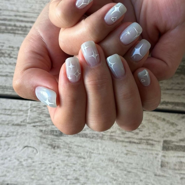 Simple white nail designs never go out of style. Here, explore some of our favorite simple white nail designs, plus get tips from manicurists on how to recreate them.