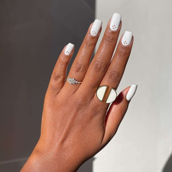 Simple white nail designs never go out of style. Here, explore some of our favorite simple white nail designs, plus get tips from manicurists on how to recreate them.