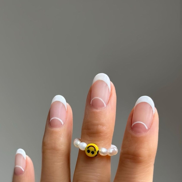 Simple white nail designs never go out of style. Here, explore some of our favorite simple white nail designs, plus get tips from manicurists on how to recreate them.