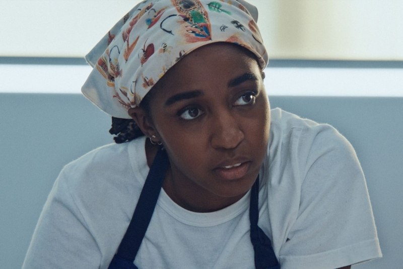 Sydney, played by Ayo Edebiri, gets a major fashion upgrade in Season 3 of 'The Bear.' Here's why it may hint at her future in Season 4 and whether or not she'll leave Carmy and the restaurant behind. Here, we unpack the hidden meaning and easter eggs behind the show's costumes.