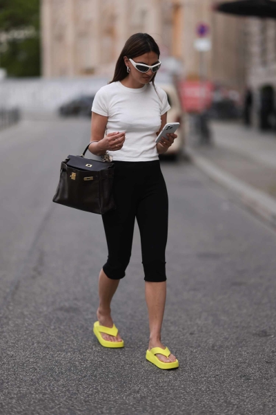 The summer heat is a perfect excuse to reach for the closest pair of capri pants you can find. If you want to dip your toe in the pant trend, take a look at five styling options ahead.