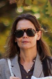 Katie Holmes wore a Kamala x Walz sweater during a sighting in New York City. See her perfect fall 'fit and voting fashion inspo, here.