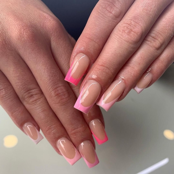 A classic French manicure never goes out of style, but that doesn't mean you can't switch it up by swapping out the traditional white for a more playful color.