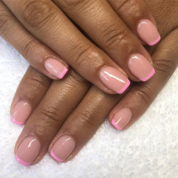 A classic French manicure never goes out of style, but that doesn't mean you can't switch it up by swapping out the traditional white for a more playful color.