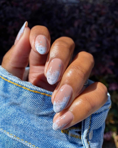 A French manicure is timeless, but a seasonal twist on the neutral look is always welcome. Come winter, cool metallics and warm, jewel-toned hues are extra fitting. Here are 10 seasonal variations to try.