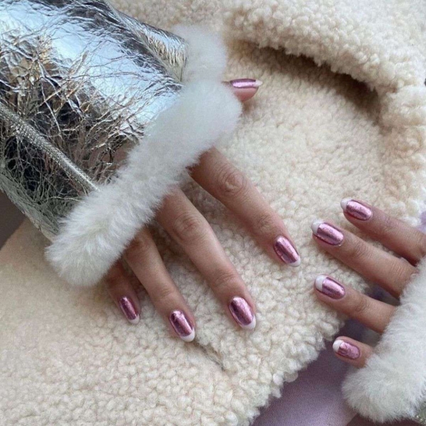 A French manicure is timeless, but a seasonal twist on the neutral look is always welcome. Come winter, cool metallics and warm, jewel-toned hues are extra fitting. Here are 10 seasonal variations to try.