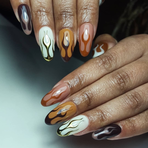 An optimistic and warm fire sign, Sagittarius isn't afraid to stand out. Whether you're about to celebrate your birthday or just want to fit the vibe of the season, we've got 20 Sagittarius-inspired manicures.