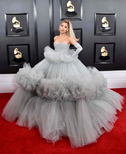 Ariana Grande knows how to command attention with her magical style. From concert-ready outfits to "Wicked"-coded dresses, we list the singer's 21 best red carpet looks.