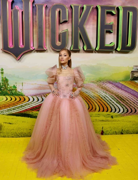 Ariana Grande knows how to command attention with her magical style. From concert-ready outfits to "Wicked"-coded dresses, we list the singer's 21 best red carpet looks.