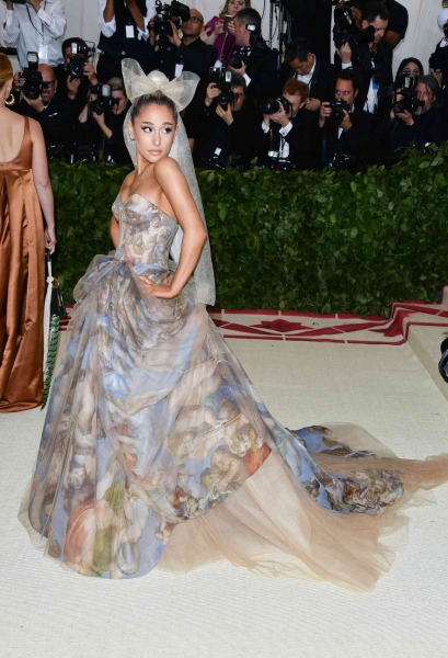 Ariana Grande knows how to command attention with her magical style. From concert-ready outfits to "Wicked"-coded dresses, we list the singer's 21 best red carpet looks.