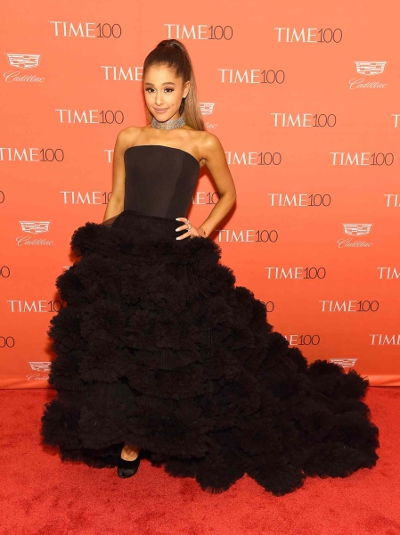 Ariana Grande knows how to command attention with her magical style. From concert-ready outfits to "Wicked"-coded dresses, we list the singer's 21 best red carpet looks.