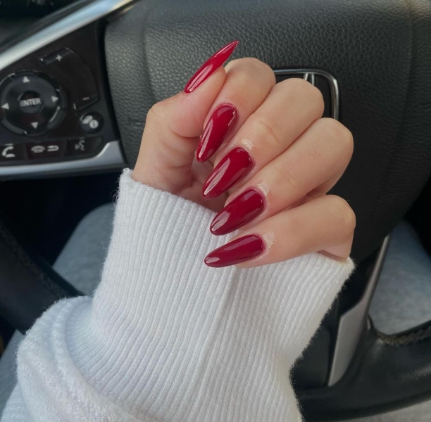 As fabulous as red wine looks in a glass, its color is even more stunning for a moody autumnal manicure. Here, scroll through 20 red wine nail looks perfect for fall.