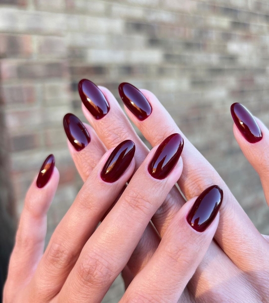 As fabulous as red wine looks in a glass, its color is even more stunning for a moody autumnal manicure. Here, scroll through 20 red wine nail looks perfect for fall.