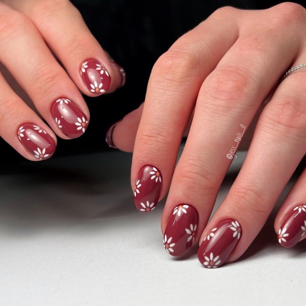 As fabulous as red wine looks in a glass, its color is even more stunning for a moody autumnal manicure. Here, scroll through 20 red wine nail looks perfect for fall.