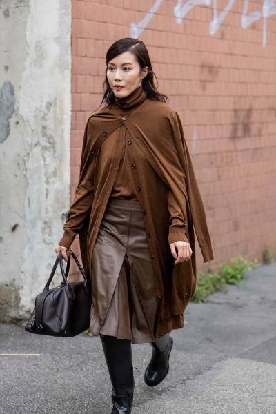 Believe it or not, a cape can be quite versatile outerwear: it's a chic topper that works at various lengths, in various materials, and with various base layer outfits. Here are a few ways to style the dramatic piece.