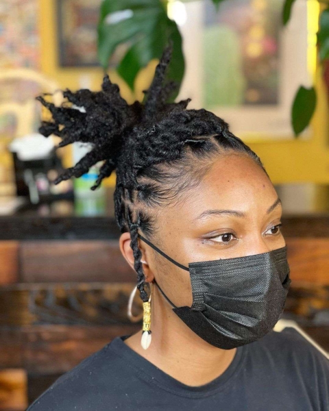 Dreadlock hairstyles can range from ponytails, twists, braids, and more. Get inspiration for dreadlocks styles for Black women, here.