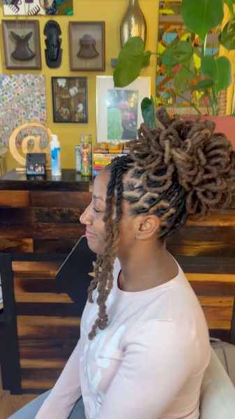 Dreadlock hairstyles can range from ponytails, twists, braids, and more. Get inspiration for dreadlocks styles for Black women, here.