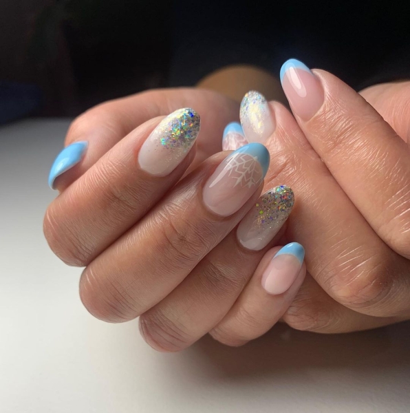 Embrace winter nail designs by incorporating elements like cool-toned colors and cable-knit textures. Scroll through 50 inspirational photos here.