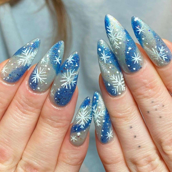 Embrace winter nail designs by incorporating elements like cool-toned colors and cable-knit textures. Scroll through 50 inspirational photos here.