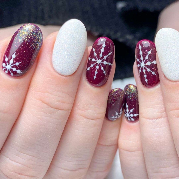 Embrace winter nail designs by incorporating elements like cool-toned colors and cable-knit textures. Scroll through 50 inspirational photos here.