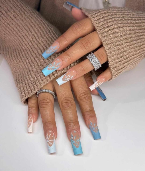 Embrace winter nail designs by incorporating elements like cool-toned colors and cable-knit textures. Scroll through 50 inspirational photos here.