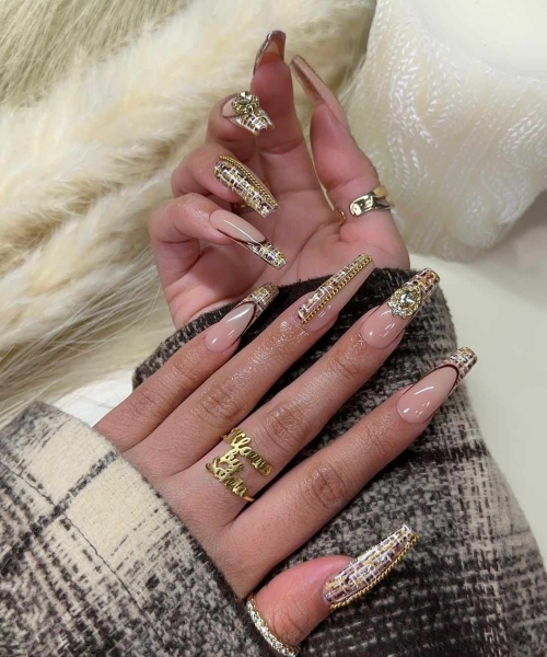 Embrace winter nail designs by incorporating elements like cool-toned colors and cable-knit textures. Scroll through 50 inspirational photos here.