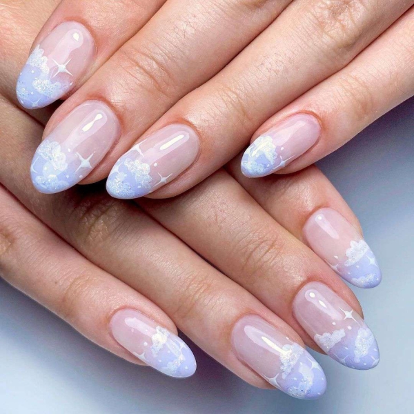 Embrace winter nail designs by incorporating elements like cool-toned colors and cable-knit textures. Scroll through 50 inspirational photos here.