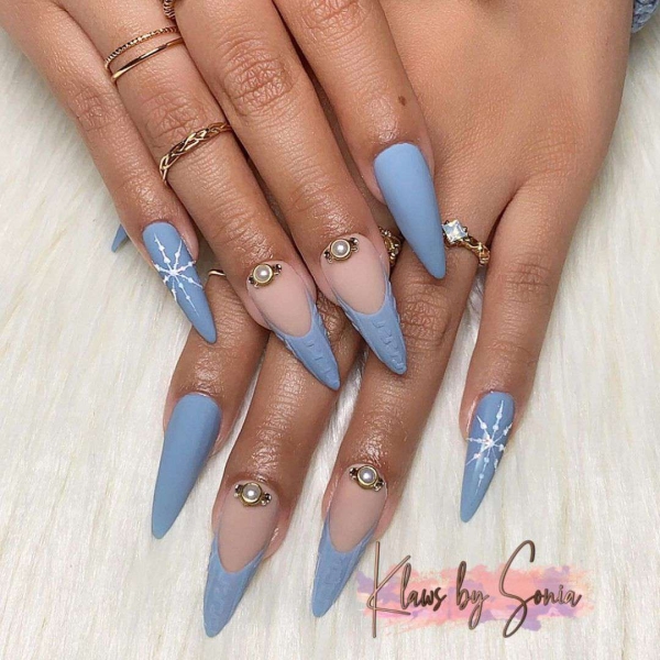 Embrace winter nail designs by incorporating elements like cool-toned colors and cable-knit textures. Scroll through 50 inspirational photos here.