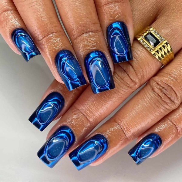 Embrace winter nail designs by incorporating elements like cool-toned colors and cable-knit textures. Scroll through 50 inspirational photos here.