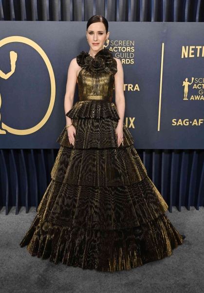 From sizzling Versace numbers to striking Sergio Hudson gowns and suits, she’s always pulling out all the stops. Here are Rachel Brosnahan's best red carpet looks.