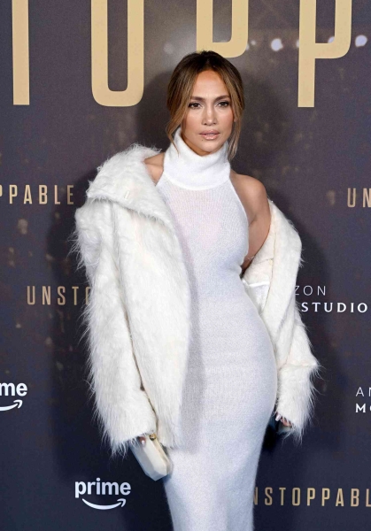 Jennifer Lopez nailed cozy season dressing by putting a glam spin on a soft knit dress for a London screening of her film 'Unstoppable.'