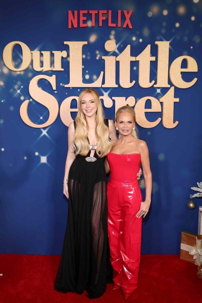 Lindsay Lohan wore a plunging little black dress that was completely sheer from the waist down for a New York screening of 'Our Little Secret.' See her sultry frock, here.