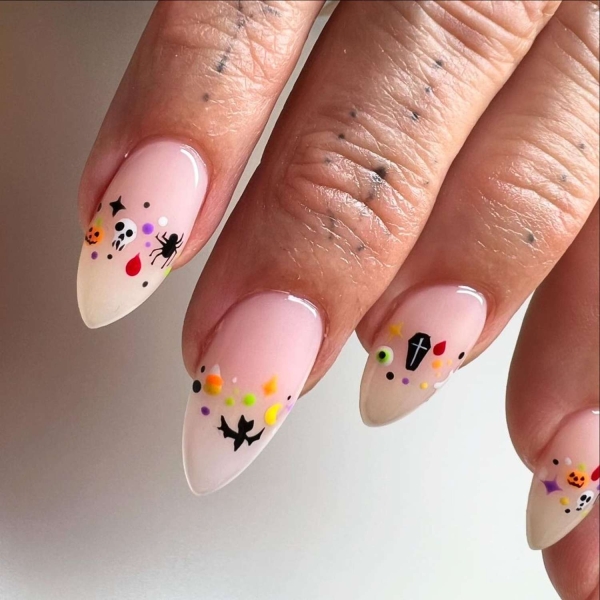 Nothing says spooky season like short Halloween nails. Here, explore 17 short Halloween nail designs that are a whole mood.