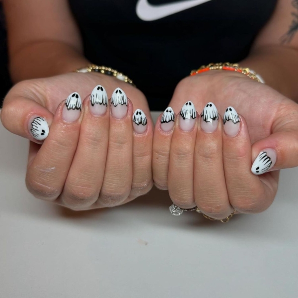 Nothing says spooky season like short Halloween nails. Here, explore 17 short Halloween nail designs that are a whole mood.