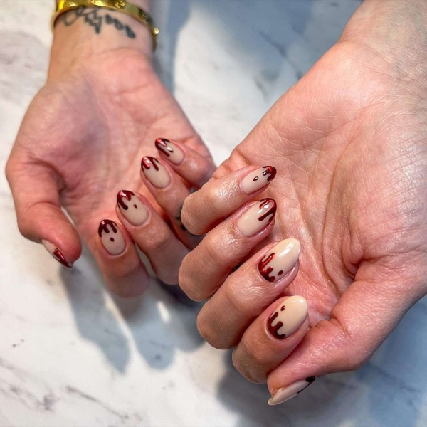 Nothing says spooky season like short Halloween nails. Here, explore 17 short Halloween nail designs that are a whole mood.