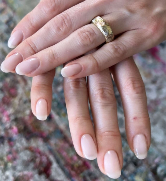 Nude nail colors are flesh-toned shades that provide a seamless transition from nail to skin. Check out 21 nude polishes for light, medium, and deep skin tones.