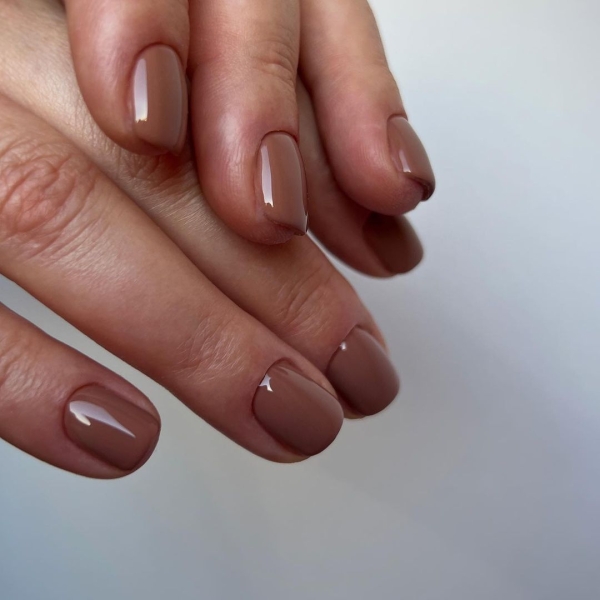 Nude nail colors are flesh-toned shades that provide a seamless transition from nail to skin. Check out 21 nude polishes for light, medium, and deep skin tones.