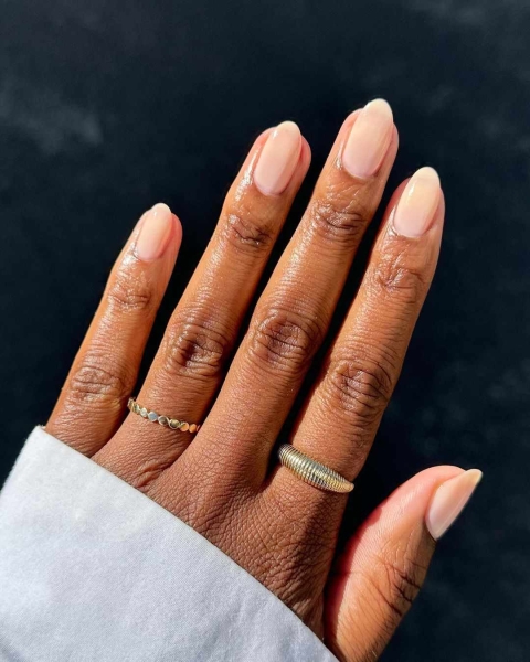 Nude nail colors are flesh-toned shades that provide a seamless transition from nail to skin. Check out 21 nude polishes for light, medium, and deep skin tones.