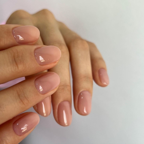 Nude nail colors are flesh-toned shades that provide a seamless transition from nail to skin. Check out 21 nude polishes for light, medium, and deep skin tones.