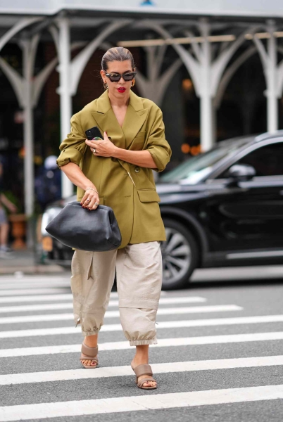 Olive green is the perfect fall neutral. It goes with everything while adding a unique character of its own. Ahead, find 15 ways to style it.