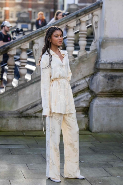 Satin pajama sets have become a street style staple and we've got 14 fresh ways to wear them. Here's how to wear a satin pajama set outside of the house for date night, brunch, and everything in between.