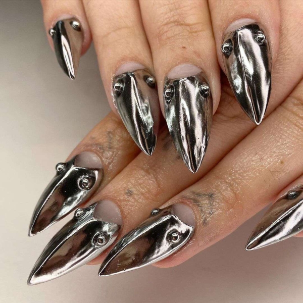 Scorpios are mysterious, passionate, magnetic, and ambitious. So to honor the sign through a manicure, the look should be anything but simple. Here are 20 befitting looks.