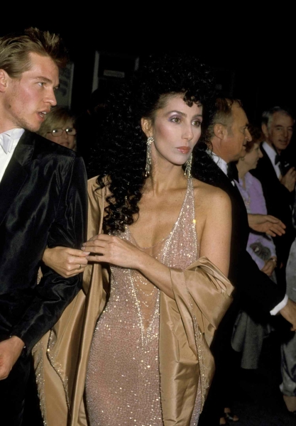 Since she rose to fame in the 1960s, the Goddess of Pop has been known as much for her dazzling looks as her stunning vocals. These are Cher's 15 most iconic looks, from the stage to the red carpet.