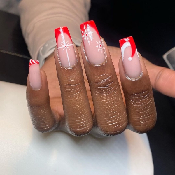 Snowflake nail art is a classic look that can be worn throughout fall and winter. Whether you want a detailed snowflake on each finger, or you want your nails to look flocked, snowy nails are all up to your personal interpretation. We share some of the best versions of the trend, here.